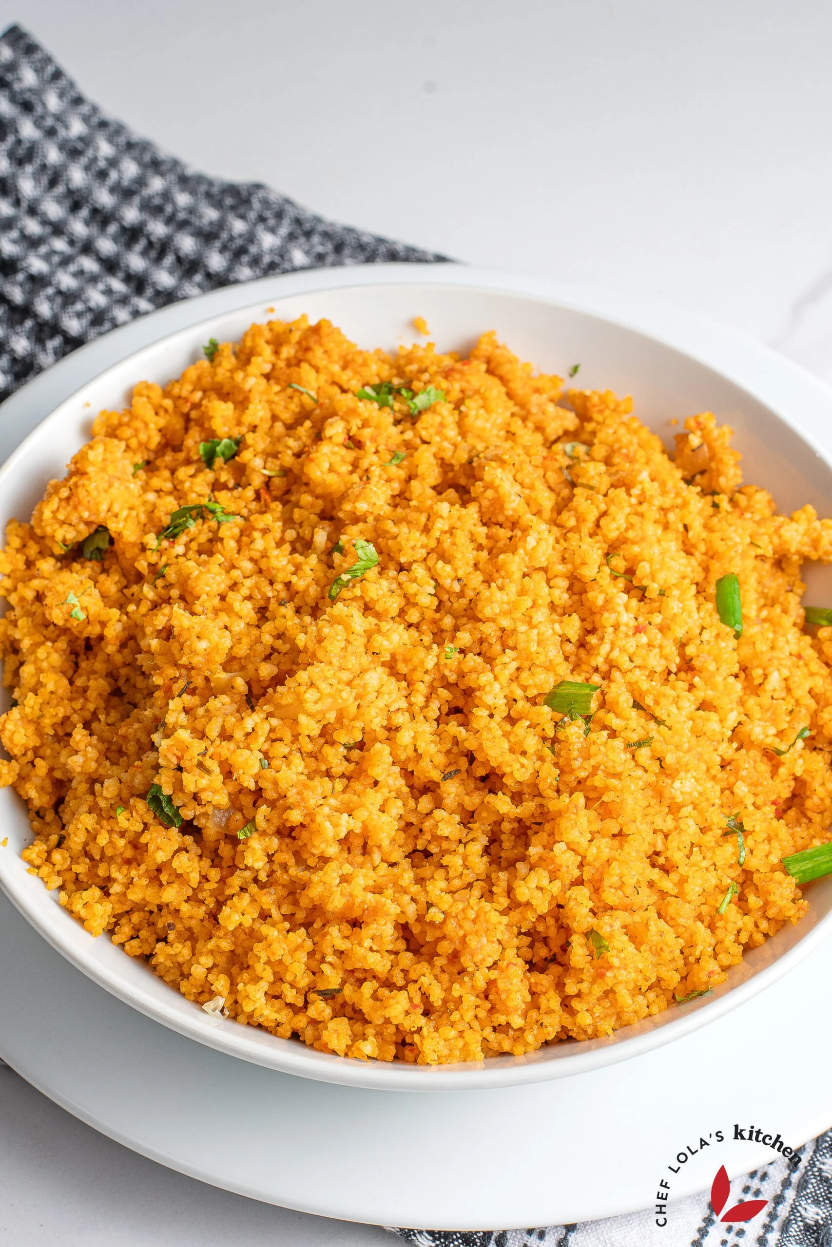 Colorful Jollof couscous plate with a burst of flavor