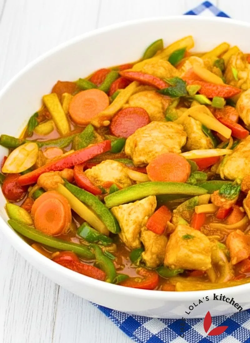 juicy chicken chunks coated in savory soy-ginger sauce with red and green bell peppers