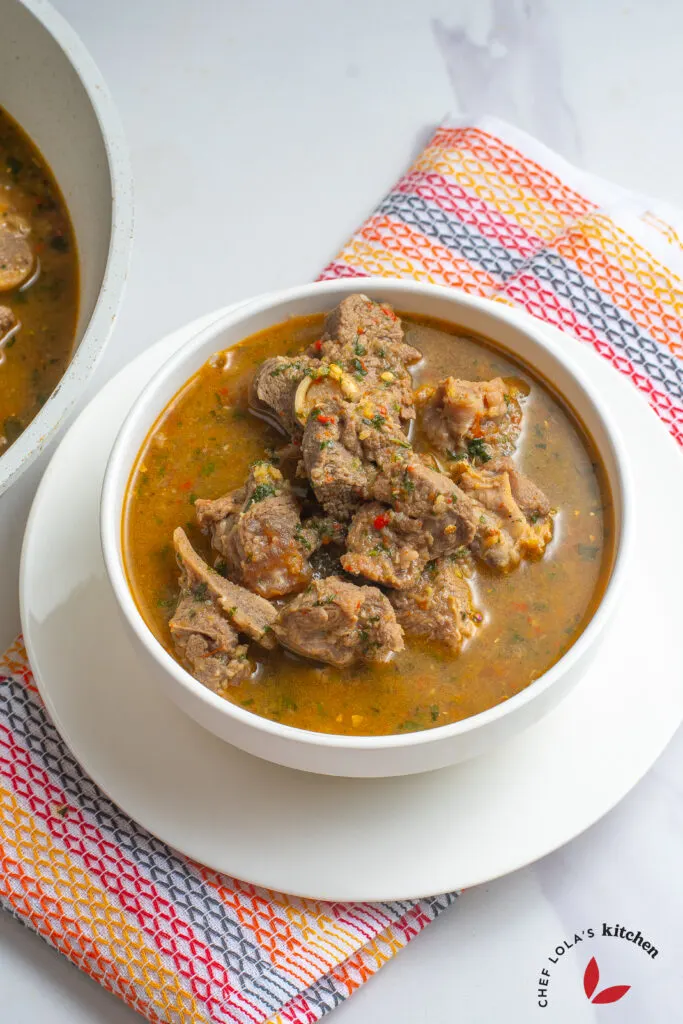 Spicy goat meat pepper soup, a hearty Nigerian delicacy