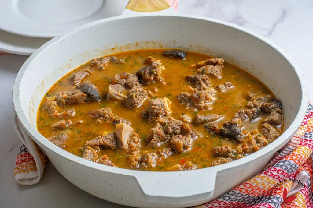 Flavorful goat meat pepper soup, a Nigerian favorite made with tender goat meat and spicy peppers
