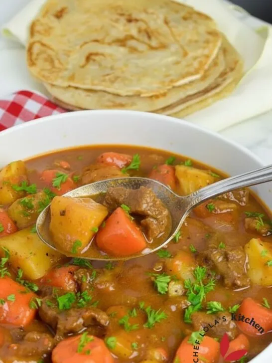 A beautiful scoop of beef potatoes and carrots stew