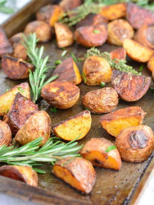 Garlic Rosemary Roasted Potatoes in a baking sheet