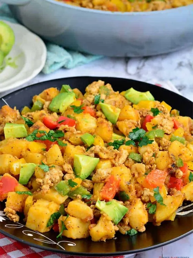 Sweet potato hash with avocado and bell peppers