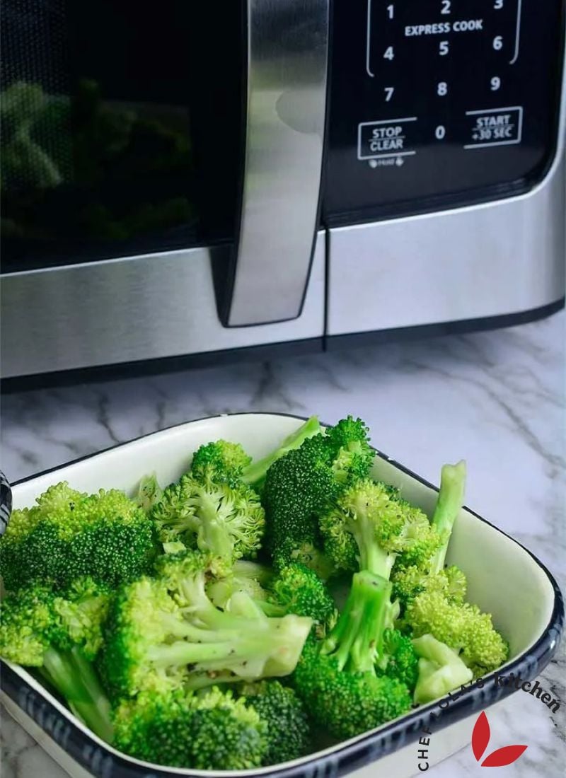 Bright green broccoli florets cooked in minutes using a simple microwave steaming technique