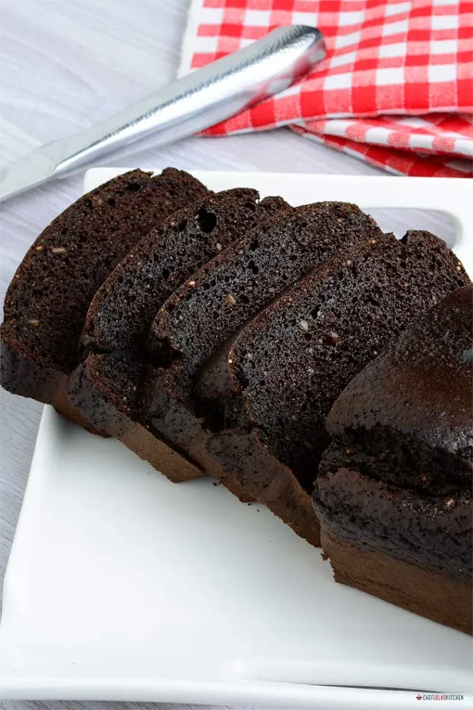 Slices of flourless chocolate cake with a rich, dense texture on a plate.