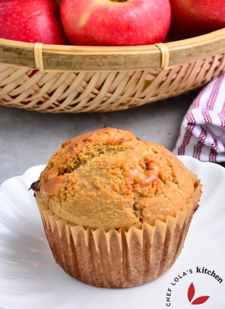 Banana muffins made with oats, served warm and golden brown.