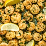 Shrimp sautéed in garlic, wine, lemon and garlic sauce. Garnished with lemon wedges and parsley.