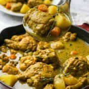 Delicious homemade Jamaican curry chicken cooked in a skillet