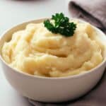 Reheated mashed potatoes garnished with parsley