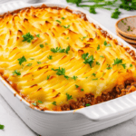 Homemade Shepherd's Pie fresh from the oven with golden potato top.
