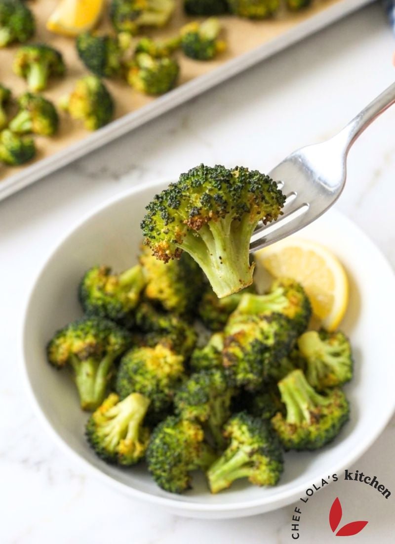 Close-up of crispy oven-roasted broccoli with browned edges.