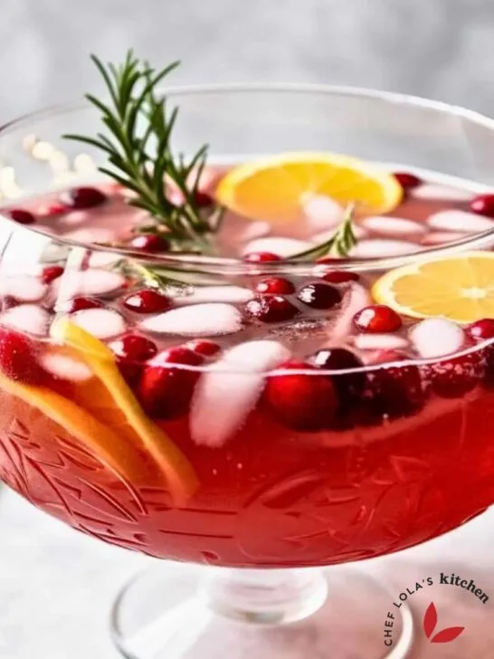 Holiday punch filled to the brim in a crystal punch bowl, brimming with Christmas cheer."