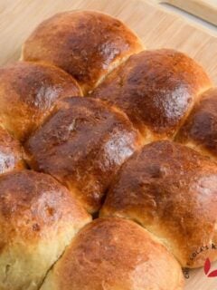 Golden-brown, fluffy air fryer bread rolls fresh from the air fryer