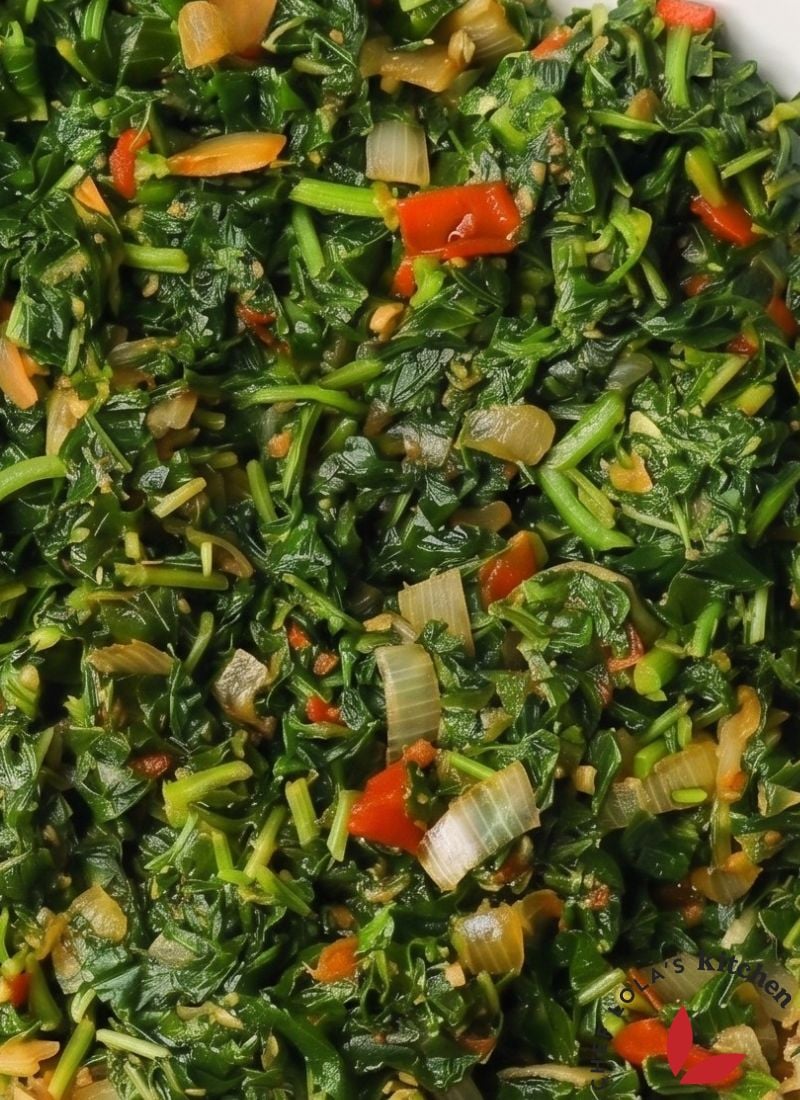 Close-up of seasoned Jamaican callaloo cooked until tender and flavorful.