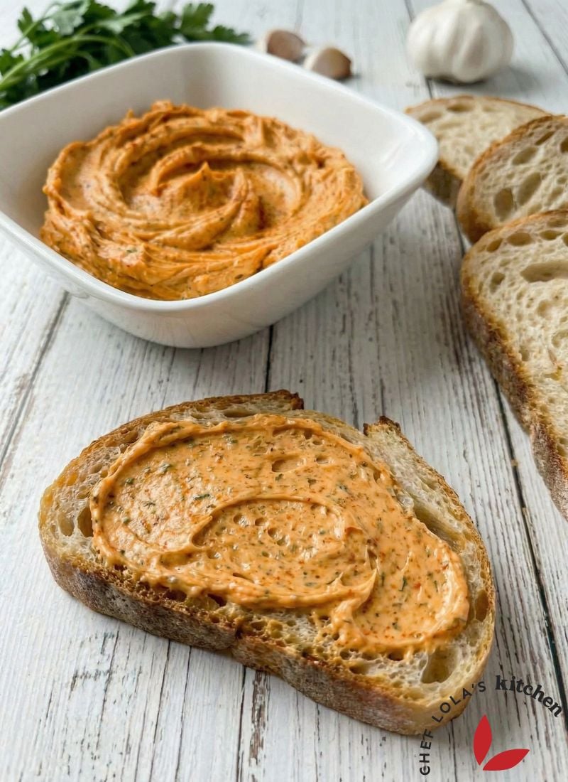 Slice of bread generously spread with homemade Cajun butter.