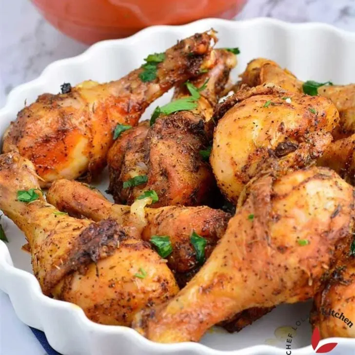 Freshly baked Chicken Drumsticks served in a bowl