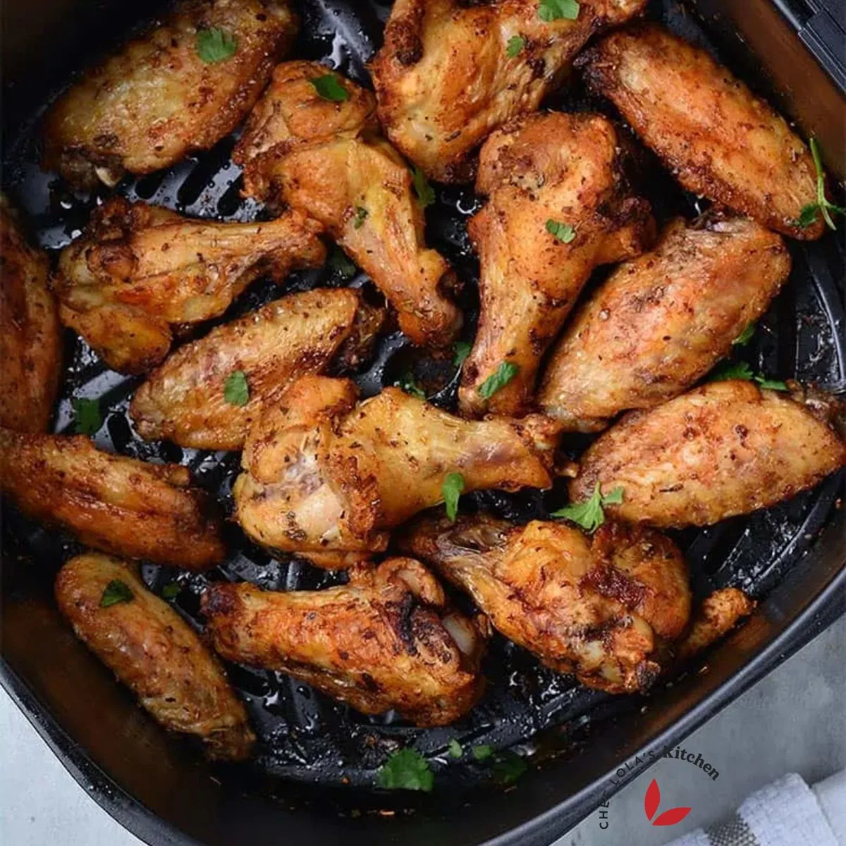Air fried chicken wings garnished with parsley