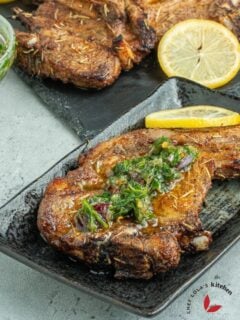 Air fryer lamb chops garnished with chimichurri