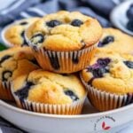 Freshly baked low-carb almond flour muffins studded with plump blueberries.