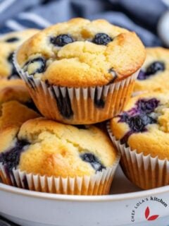 Freshly baked low-carb almond flour muffins studded with plump blueberries.