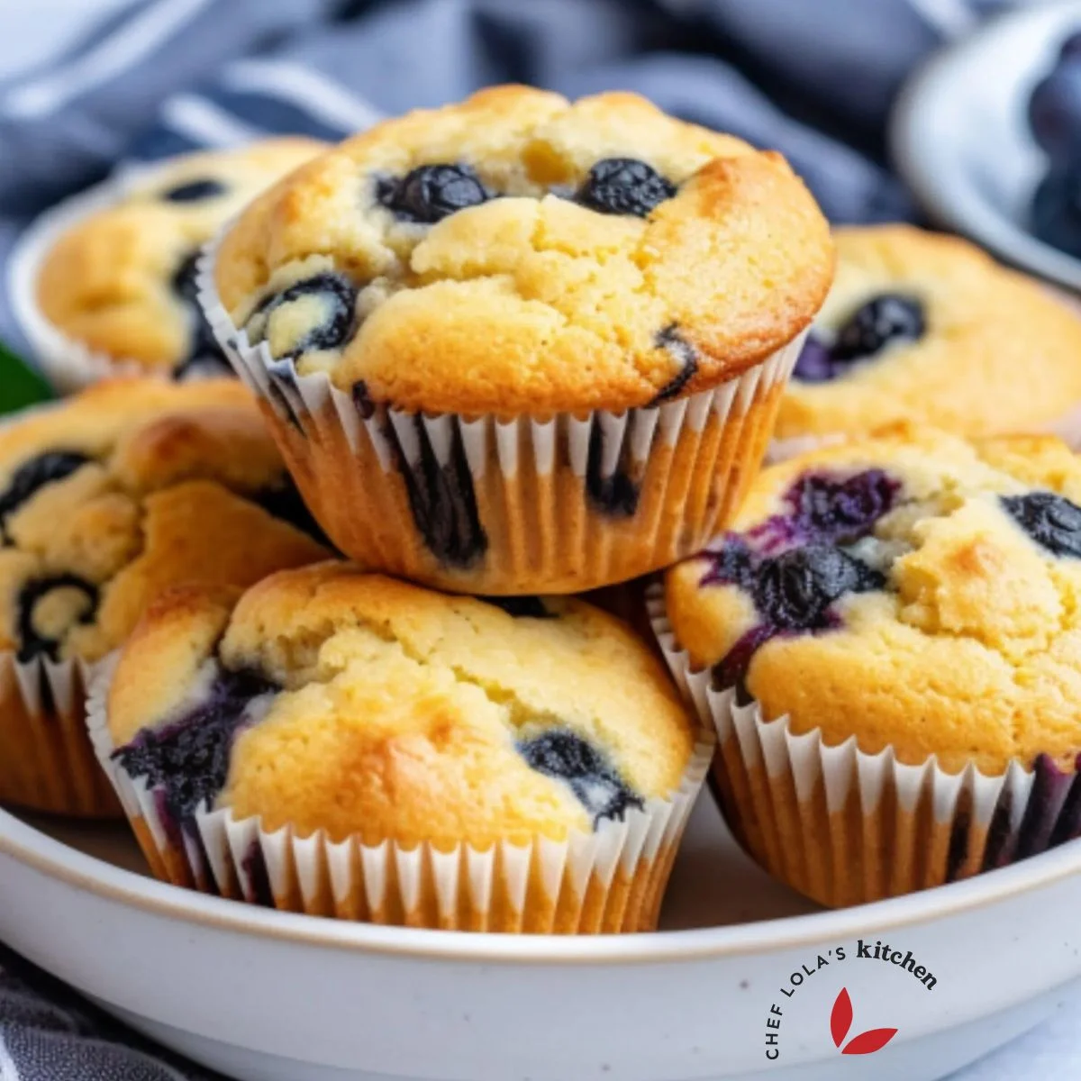 Freshly baked low-carb almond flour muffins studded with plump blueberries.