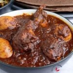 Doro wat served in a bowl