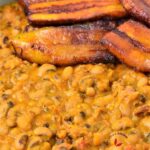 Ewa riro in a pot with plantains: Ewa riro is a Nigerian recipe, and it is also referred to as stewed Beans or Beans Porridge