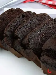 Sliced flourless chocolate cake on a plate