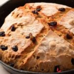 Freshly baked Irish Soda Bread in a cast Iron Skillet