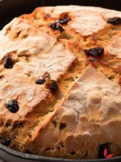 Freshly baked Irish Soda Bread in a cast Iron Skillet