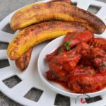 Perfectly Grilled plantains served with spicy wings