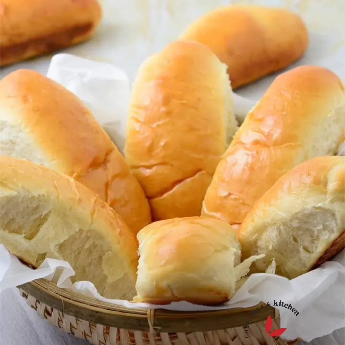 Hot dog buns in a small basket
