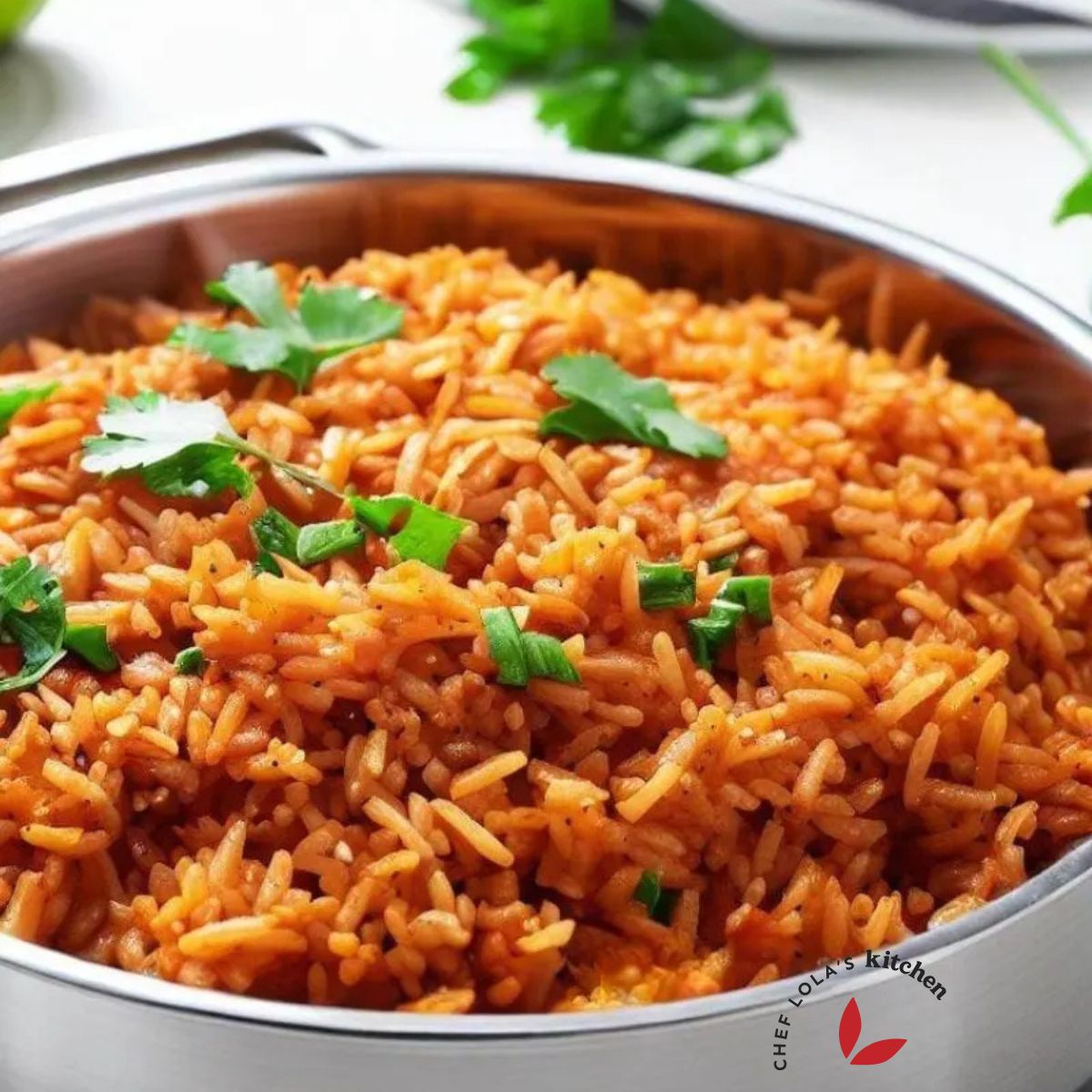 Mexican rice in a skillet garnished with cilantro