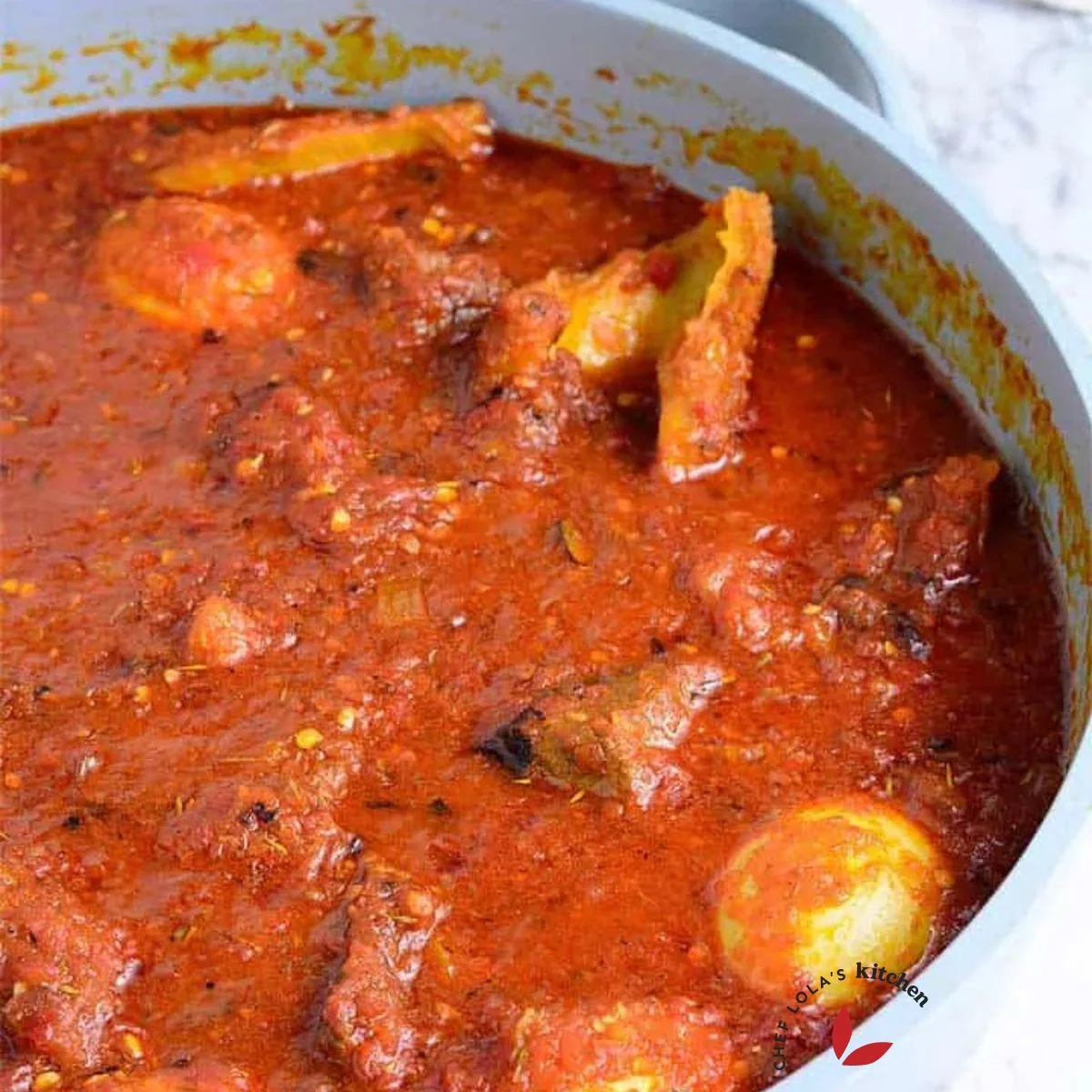 Nigerian pepper sauce with beef, tripe and boiled Eggs