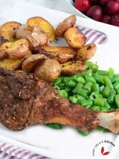 Oven Roasted Turkey Legs served with potatoes and green beans