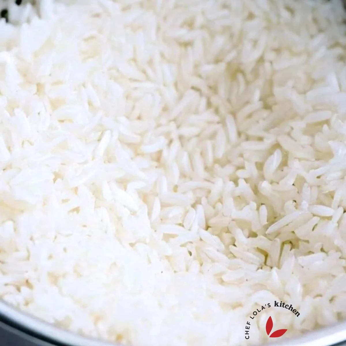 Parboiled rice in a colander showing it's well separated grains