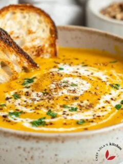 A comforting bowl of roasted pumpkin soup, perfectly seasoned