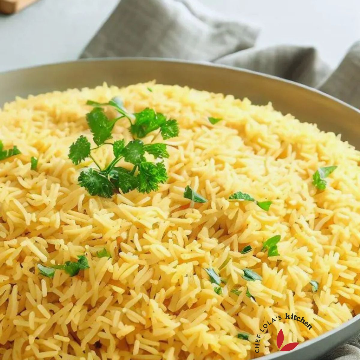 Delicious Saffron rice in a skillet beautifully garnished with parsley