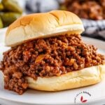 Close-up view of a homemade Sloppy Joe sandwich on a toasted bun.
