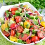 Tomato cucumber salad in a bowl