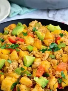 Sweet potato hash with avocado and bell peppers