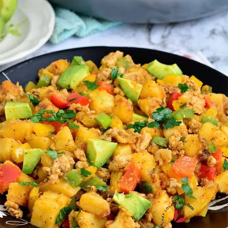 Sweet potato hash with avocado and bell peppers