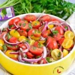 Tomato Salad – made with ripe, juicy tomatoes, and crispy onions dressed with olive oil, vinegar, salt, and pepper.