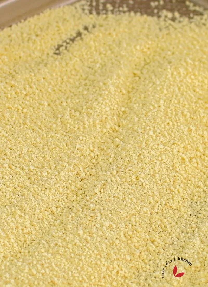 Homemade couscous preparation with semolina flour and water