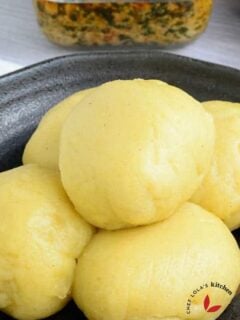 Fufu moulded into balls and served in a plate