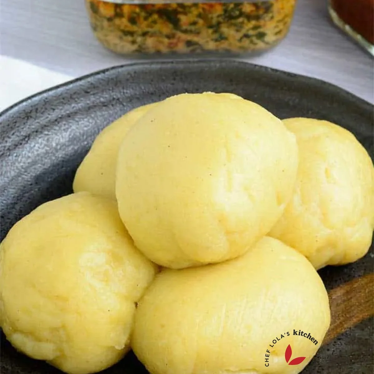 Fufu moulded into balls and served in a plate
