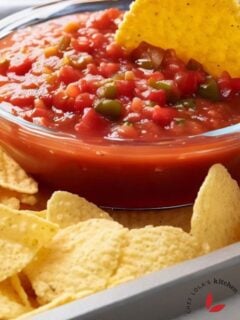 A fresh homemade restaurant-style salsa served in a bowl with corn chips