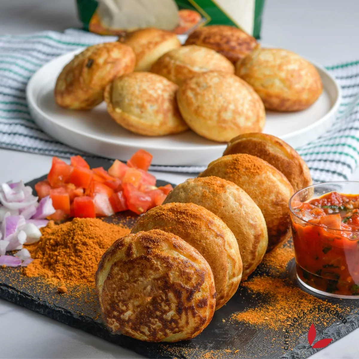 Fresh and soft traditional masa, made from semolina flour, golden brown, airy, and served hot