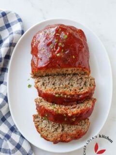 Juicy classic meatloaf topped with sweet and tangy tomato glaze