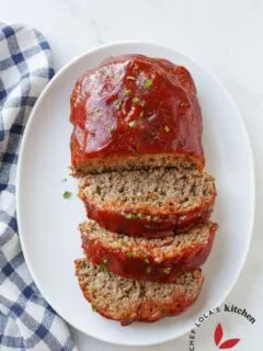 Juicy classic meatloaf topped with sweet and tangy tomato glaze